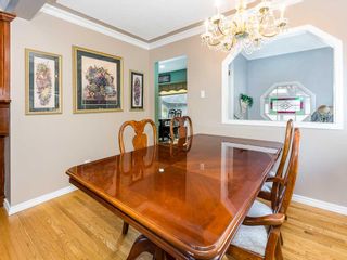 Photo 7: 411 Wilkinson Place SE in Calgary: Willow Park Detached for sale : MLS®# A2096753