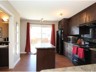 Photo 15: 602 2445 KINGSLAND Road SE: Airdrie Townhouse for sale : MLS®# C3624049
