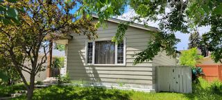 Photo 1: 27 Erin Woods Drive SE in Calgary: Erin Woods Detached for sale : MLS®# A1235459