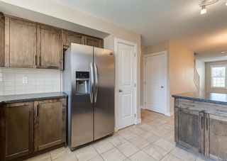 Photo 12: 59 Fireside Parkway: Cochrane Row/Townhouse for sale : MLS®# A2053037