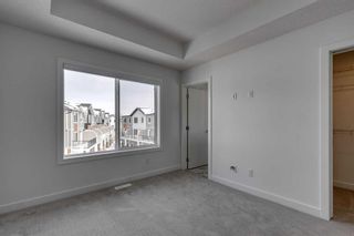 Photo 23: 801 335 Creekside Boulevard SW in Calgary: C-168 Row/Townhouse for sale : MLS®# A2118234