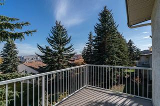 Photo 30: 112 Strathlorne Mews SW in Calgary: Strathcona Park Row/Townhouse for sale : MLS®# A2087332