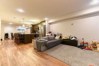 Photo 7: 414 Cranford Mews SE in Calgary: Cranston Row/Townhouse for sale : MLS®# A2054453