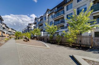 Main Photo: A103 20487 65 Avenue in Langley: Willoughby Heights Condo for sale in "TOWNSHIP COMMONS" : MLS®# R2877957