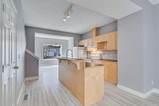Photo 7: 135 Bridlewood View SW in Calgary: Bridlewood Row/Townhouse for sale : MLS®# A2129384