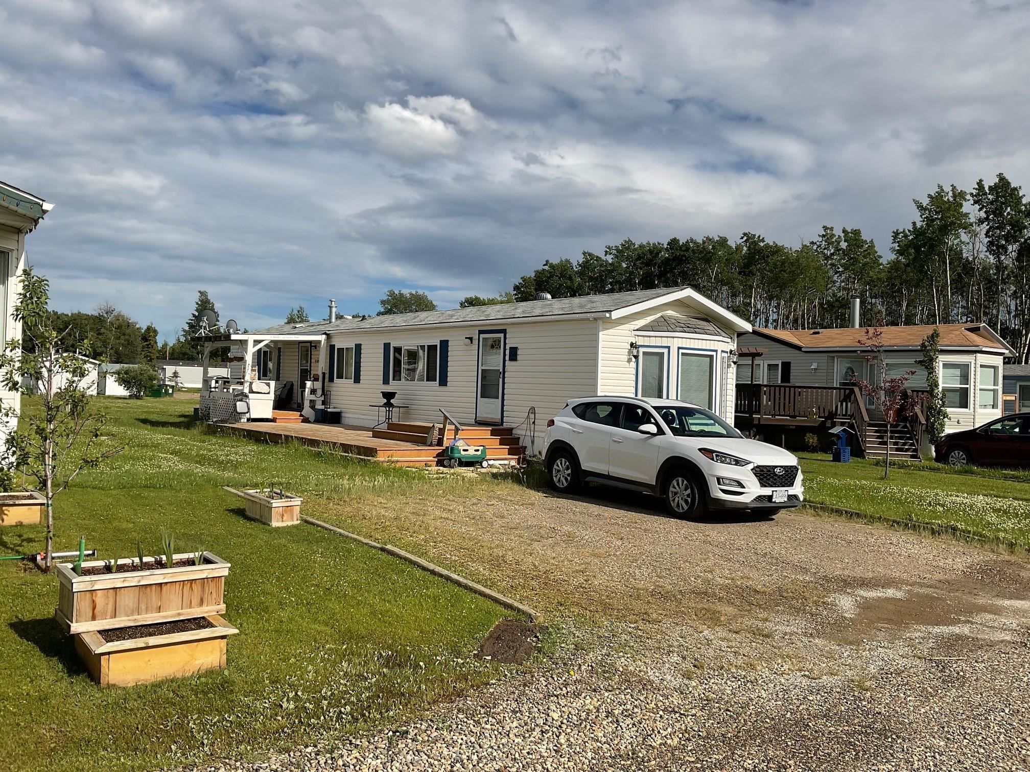 Main Photo: 56 7414 FOREST LAWN Road in Fort St. John: Baldonnel Manufactured Home for sale in "FOREST LAWN MOBILE HOME PARK" : MLS®# R2658274
