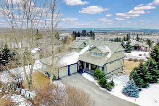 Photo 4: 219 Slopeview Drive SW in Calgary: Springbank Hill Detached for sale : MLS®# A1187658