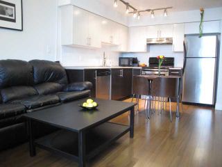 Photo 1: 105 5649 KINGS Road in Vancouver: University VW Townhouse for sale in "GALLERIA" (Vancouver West)  : MLS®# V1000398
