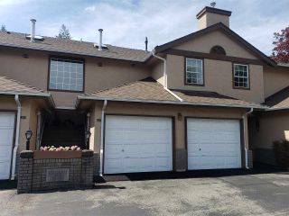 Photo 1: 224 14861 98 Avenue in Surrey: Guildford Townhouse for sale in "The Mansions" (North Surrey)  : MLS®# R2429452