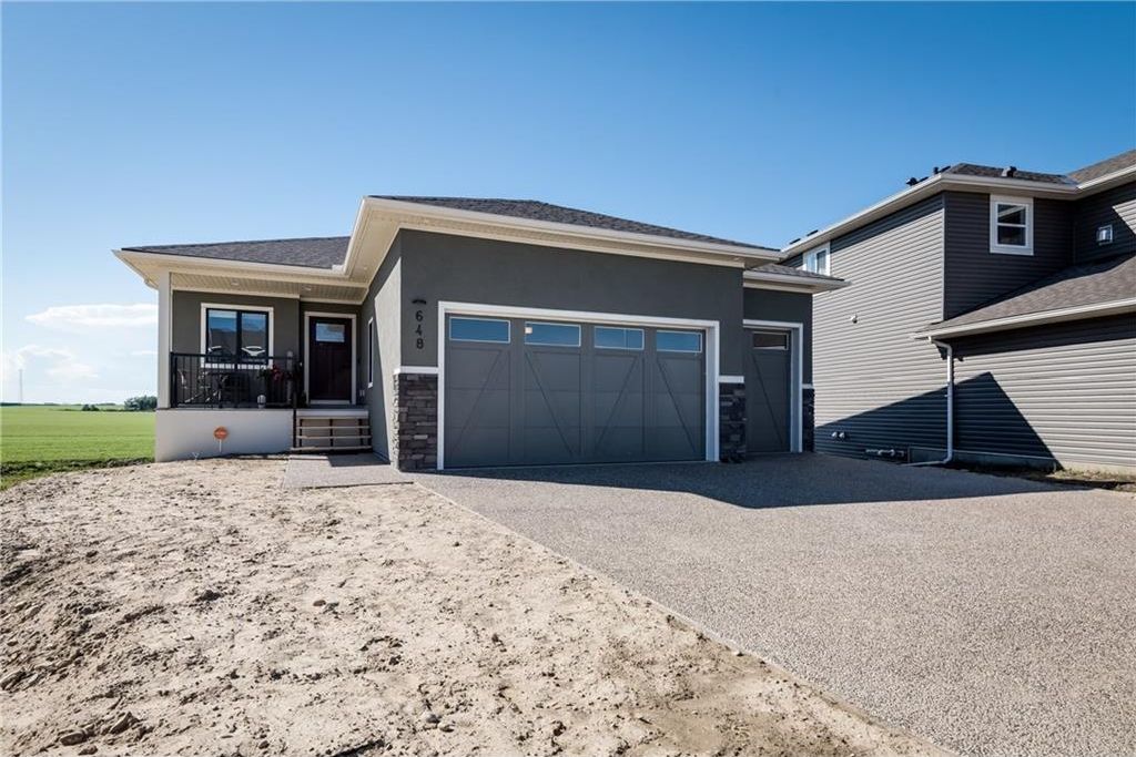 Main Photo: 648 Harrison Court: Crossfield House for sale : MLS®# C4122544