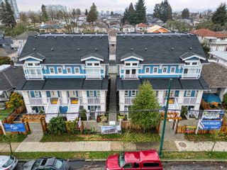 Photo 2: 4789 SLOCAN Street, Vancouver, V5R 2A2