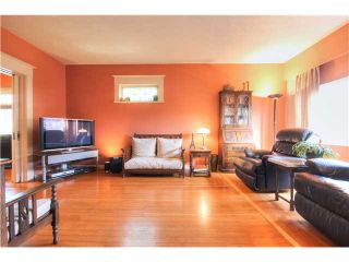 Photo 5: 1635 SALSBURY Drive in Vancouver: Grandview VE House for sale in "COMMERCIAL DRIVE" (Vancouver East)  : MLS®# V1109547