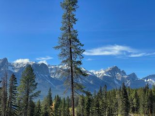 Photo 1: 404 Mountain Tranquility Place: Canmore Residential Land for sale : MLS®# A2084859