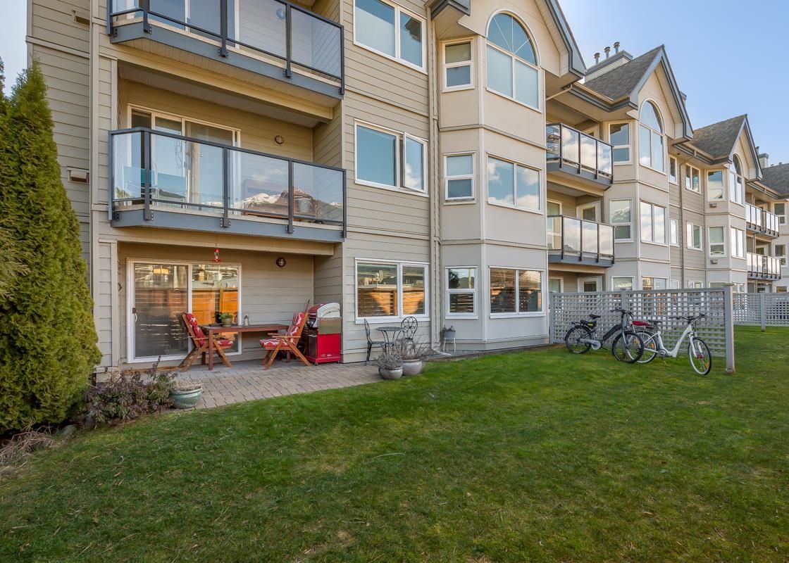 Main Photo: 112 1466 PEMBERTON Avenue in Squamish: Downtown SQ Condo for sale in "Marina Estates" : MLS®# R2663391