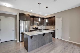Photo 1: 111 6603 New Brighton Avenue SE in Calgary: New Brighton Apartment for sale : MLS®# A2119890