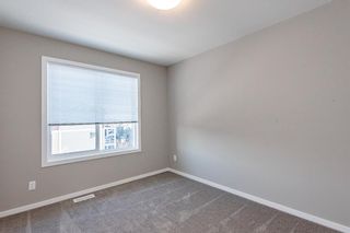 Photo 15: 202 245 Redstone Walk NE in Calgary: Redstone Apartment for sale : MLS®# A1158635