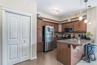 Photo 5: 2411 175 Panatella Hill NW in Calgary: Panorama Hills Apartment for sale : MLS®# A2126482