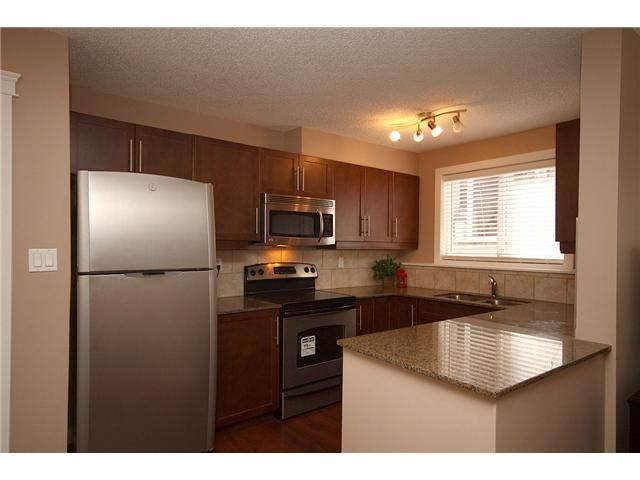 Photo 7: Photos: 7 605 67 Avenue SW in CALGARY: Kingsland Condo for sale (Calgary)  : MLS®# C3446570
