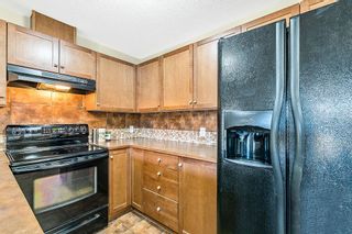 Photo 9: 2105 92 Crystal Shores Road: Okotoks Apartment for sale : MLS®# A2005622
