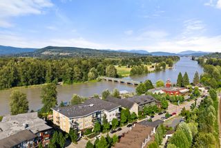 Photo 2: 401 23255 BILLY BROWN Road in Langley: Fort Langley Condo for sale in "Waterfront at Bedford Landing" : MLS®# R2706918