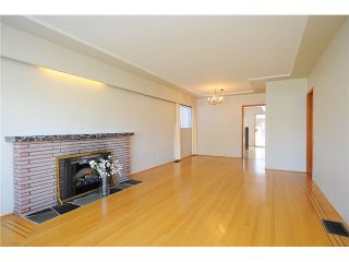 Photo 2: 6273 DUMFRIES Street in Vancouver: Knight House for sale (Vancouver East)  : MLS®# V1005644