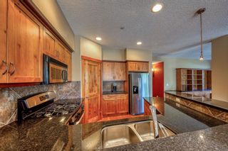 Photo 10: 310 107 Armstrong Place: Canmore Apartment for sale : MLS®# A2116102