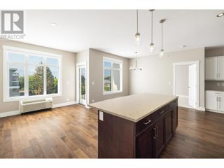 Photo 9: 1165 Sutherland Avenue Unit# 406 in Kelowna: House for sale : MLS®# 10312969