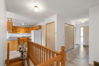 Photo 15: 47 140 Strathaven Circle SW in Calgary: Strathcona Park Semi Detached for sale : MLS®# A1205050