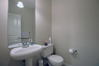 Photo 16: 242 Cougar Plateau Way SW in Calgary: Cougar Ridge Detached for sale : MLS®# A2007391