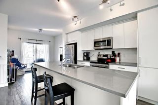 Photo 9: 1304 Jumping Pound Common: Cochrane Row/Townhouse for sale : MLS®# A1194685