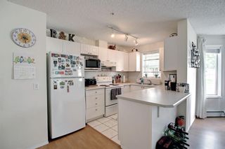 Photo 4: 101 9 Country Village Bay NE in Calgary: Country Hills Village Apartment for sale : MLS®# A2065425