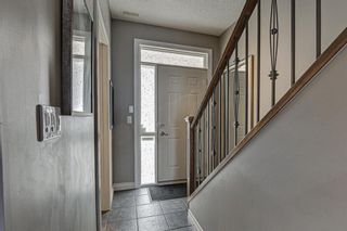 Photo 7: 7 124 Rockyledge View NW in Calgary: Rocky Ridge Row/Townhouse for sale : MLS®# A1111501