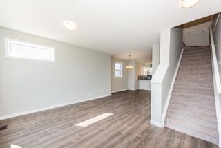 Photo 10: 121 301 REDSTONE Boulevard in Calgary: Redstone Row/Townhouse for sale : MLS®# A1246267