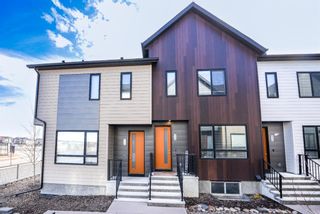 Photo 1: 318 Redstone Crescent NE in Calgary: Redstone Row/Townhouse for sale : MLS®# A1225580