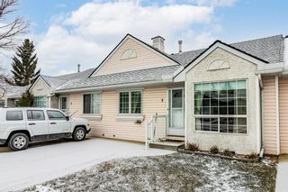 Photo 2: 4 209 Woodside Drive NW: Airdrie Row/Townhouse for sale : MLS®# A1206898
