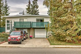 Photo 2: 7006 54 Avenue NW in Calgary: Silver Springs Semi Detached (Half Duplex) for sale : MLS®# A2079697