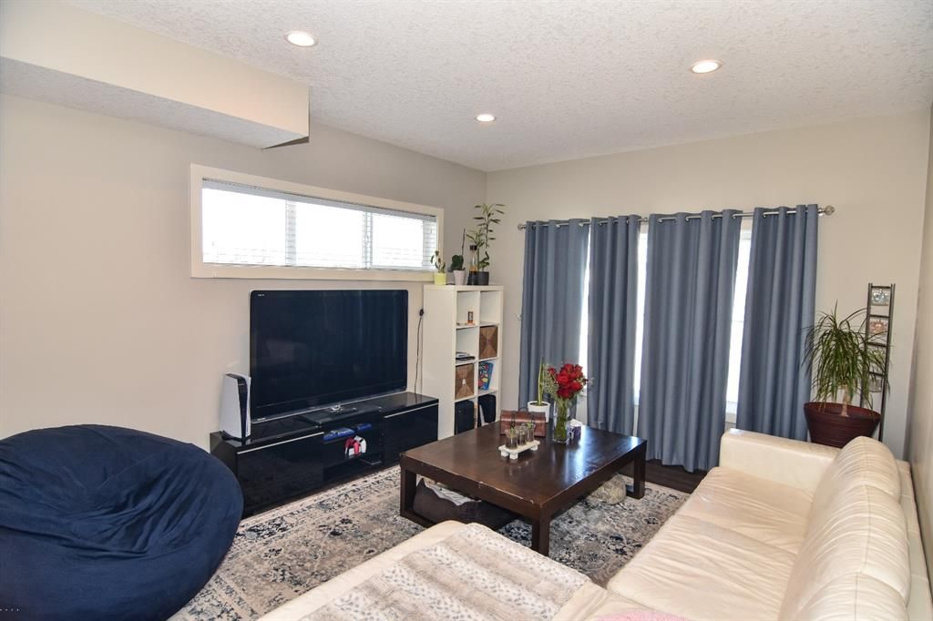 Photo 9: Photos: 516 Cranford Drive SE in Calgary: Cranston Row/Townhouse for sale : MLS®# A1198824