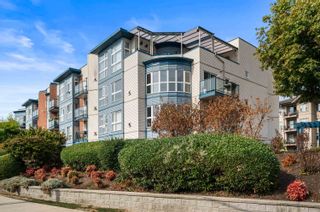 Photo 2: 404 20277 53 Avenue in Langley: Langley City Condo for sale in "METRO II" : MLS®# R2729189