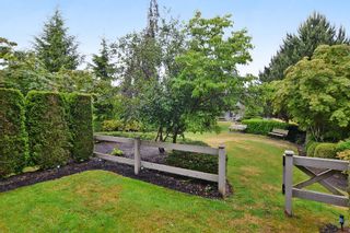Photo 20: 65 6050 166TH Street in Surrey: Cloverdale BC Townhouse for sale in "WESTFIELD" (Cloverdale)  : MLS®# F1442230