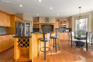 Photo 11: 29 Strathlea Court SW in Calgary: Strathcona Park Detached for sale : MLS®# A2127443