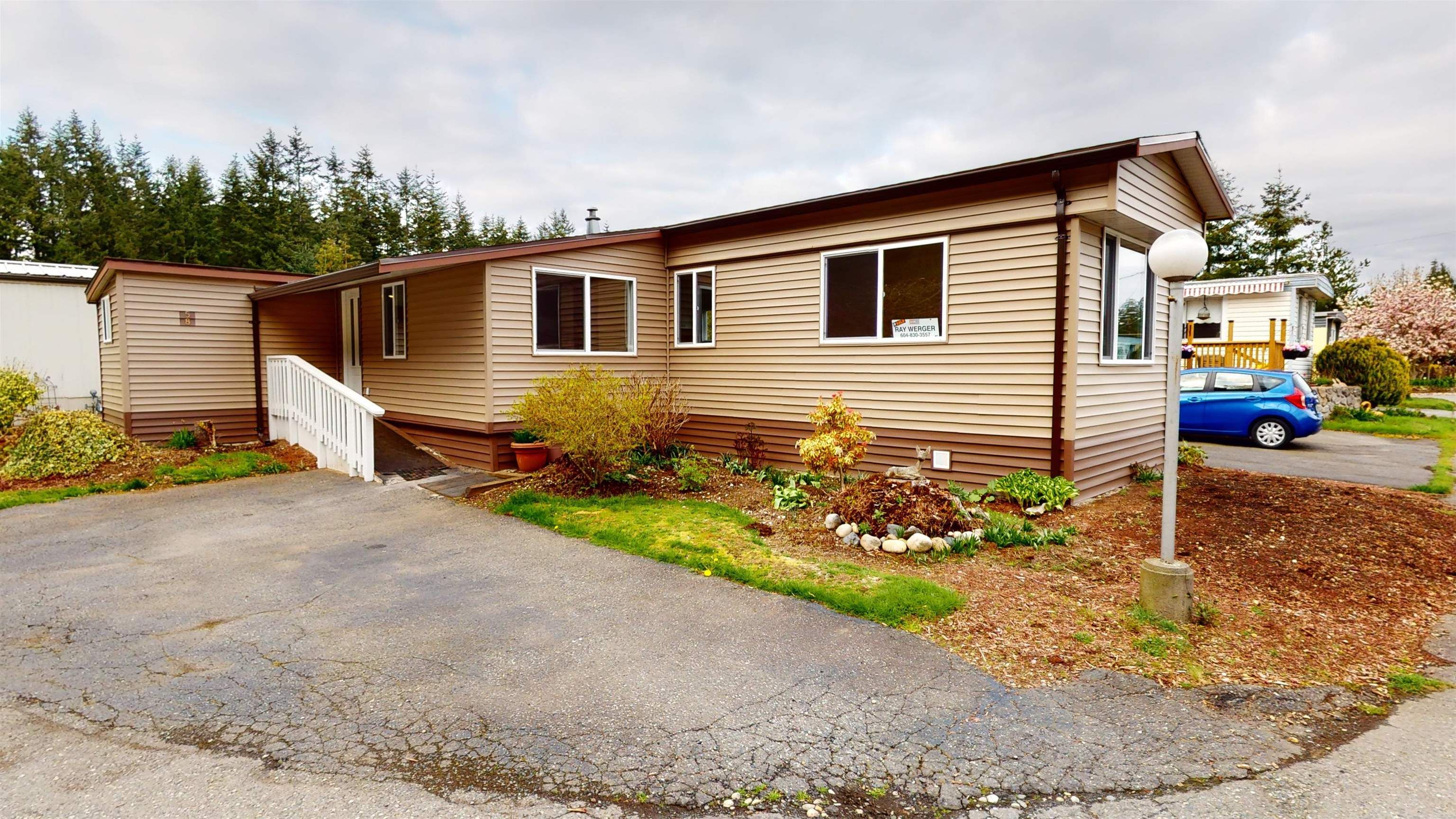 Main Photo: 58 3031 200 Street in Langley: Brookswood Langley Manufactured Home for sale in "CEDAR CREEK MANUFACTURED HOME PARK" : MLS®# R2769988