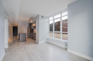Photo 5: 411 550 Riverfront Avenue SE in Calgary: Downtown East Village Apartment for sale : MLS®# A1212416