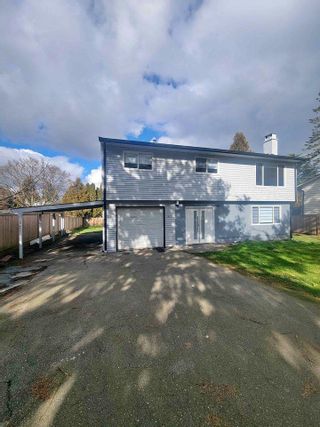 Photo 1: 19877 48 Avenue in Langley: Langley City House for sale : MLS®# R2865893