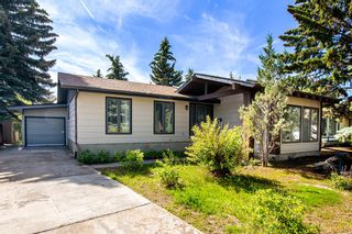 Photo 1: 924 Canterbury Drive SW in Calgary: Canyon Meadows Detached for sale : MLS®# A2002661