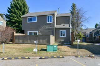 Photo 2: 1301 829 Coach Bluff Crescent in Calgary: Coach Hill Row/Townhouse for sale : MLS®# A1094909
