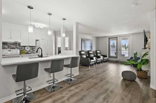 Main Photo: 404 2212 34 Avenue SW in Calgary: South Calgary Apartment for sale : MLS®# A2136375