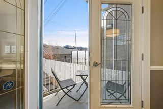 Photo 11: 2211 Bowness Road NW in Calgary: West Hillhurst Semi Detached for sale : MLS®# A1086520