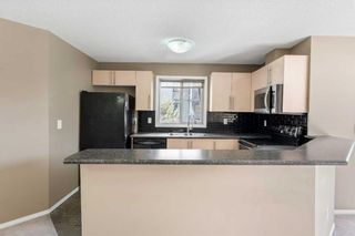 Photo 5: 2324 60 Panatella Street NW in Calgary: Panorama Hills Apartment for sale : MLS®# A2115551