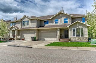 Main Photo: 67 Rockledge Terrace NW in Calgary: Rocky Ridge Semi Detached (Half Duplex) for sale : MLS®# A2138994