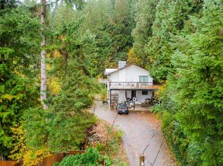 Photo 1: 14 DOWDING Road in Port Moody: North Shore Pt Moody House for sale : MLS®# R2628411